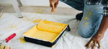 man-painting-walls-yellow (1)